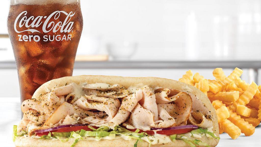 Turkey Gyro · Thinly sliced seasoned roast turkey with Greek seasonings, cool creamy tzatziki sauce, shredded lettuce, tomato and red onion in a warm pita. Visit arbys.com for nutritional and allergen information.