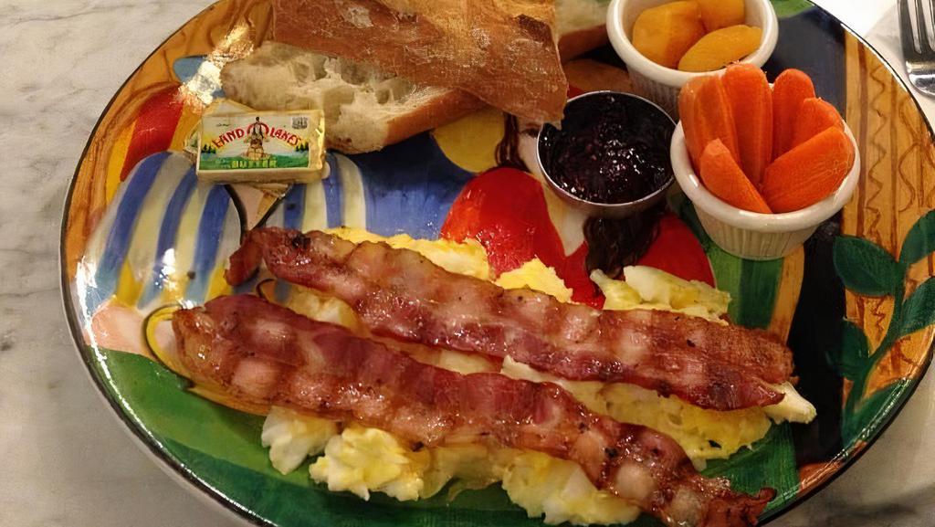Special Breakfast · Pancakes or french toast with two eggs, bacon, ham and sausage. Served with butter and syrup.