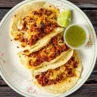 Chorizo Con Queso · Mexican sausage with cheese.