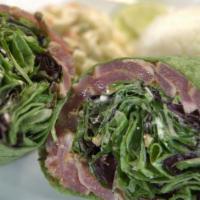 Seared Ahi Wrap · Wasabi cream sauce, mac nuts, organic spring mix. Wraps come with rice and mac salad.