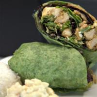 Buffalo Chicken Wrap · Crispy fried chicken, organic greens, cheddar cheese, macadamia nuts, all wraped with our ho...