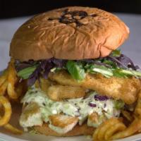 Giant Calypso Fish Sandwich · Grilled and Battered fish Layered with-in a huge homemade Passion Fruit Bun, Organic Greens,...