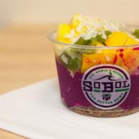 Pitaya Bowl · Our original pitaya bowl contains our delicious homemade granola, our pitaya puree and an as...