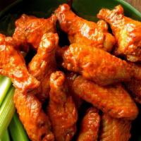 Buffalo Wings · Traditional bone-in wings, hand-tossed in your choice of
sauce or rub. Choose your
flavors! ...