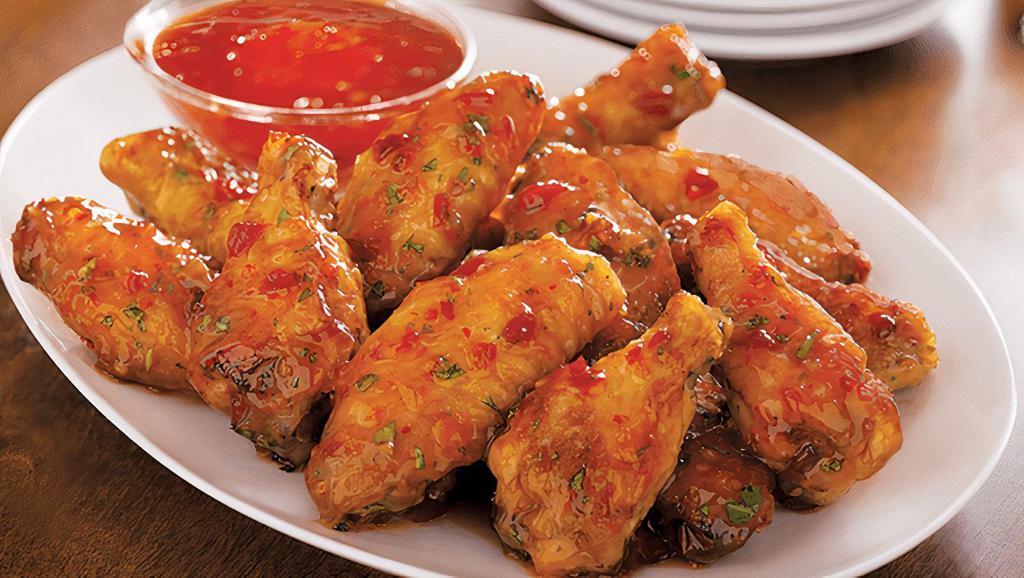 Hot Sweet & Chili · Traditional bone-in wings, hand-tossed in your choice of sauce or rub. Choose your flavors!