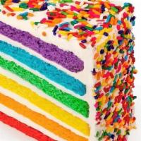 Rainbow  · Our best seller - six layers of rainbow-colored vanilla
cake filled high with a sweet vanill...