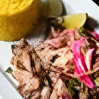 Pernil Asado I Slow Roasted Pork · Slow-roasted pork topped with pickled onions & lime.