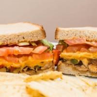 Americano · Grilled chicken, grilled peppers, grilled onions, Cheddar cheese, lettuce, tomatoes, and chi...