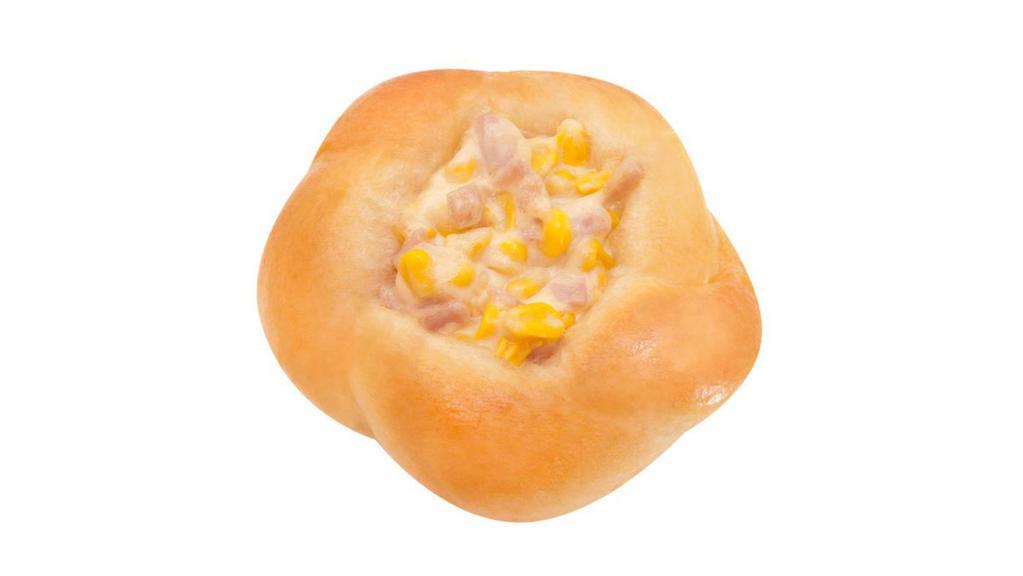 玉米包 Corn Bun · A bun with a crevice in the center, filled with a blend of sweet corn and mayo. May contain ham.