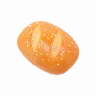 咸餐包 Plain Bun  · A plain, savory bun topped with sesame seeds.