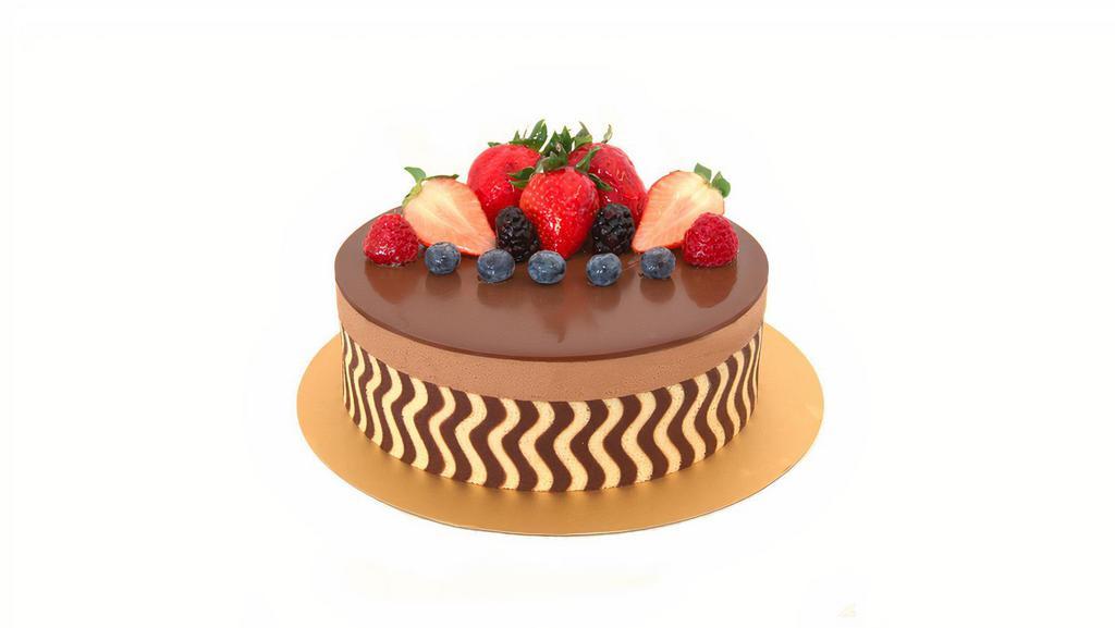 朱古力慕絲 Chocolate Mousse Cake · Chocolate mousse layered on top of chocolate sponge cake and topped with a chocolate gelatin.
