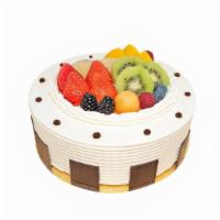 鮮果蛋糕 Fresh Fruit Cake · Freshly sliced honeydew, cantaloupe, and strawberries with a thin layer of cream fill the in...