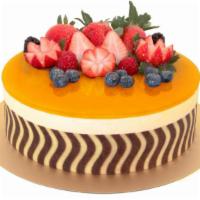  芒果幕斯蛋糕 Mango Mousse Cake · Mango mousse sits on top of a layer of vanilla sponge cake, topped with a mango mirror.