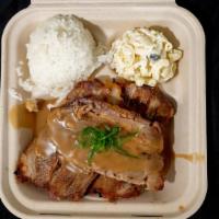 Roast Pork · Plate comes with 1 scoop rice , 1 scoop Mac salad and 2-3 slices of roast pork covered in gr...
