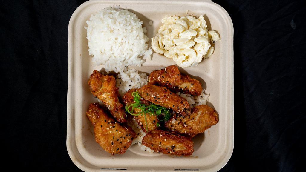 Korean Style Chicken · Plate comes with 1 scoop rice , 1 scoop Mac salad 6 pieces of chicken dipped in our homemade Korean sauce