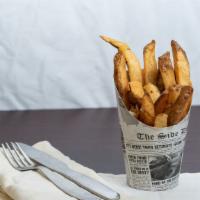 Hand Cut Fries · Hand-cut fried potatoes with ketchup.