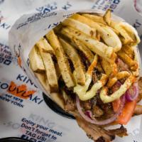 Chicken Gyro Pita Sandwich · Mouthwatering slow roasted slices of our hand-stacked chicken gyro, carved off a rotisserie ...