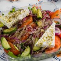 Greek Salad · Romaine lettuce, tomatoes, cucumbers, red onions, kalamata olives and Greek feta cheese.
Ser...