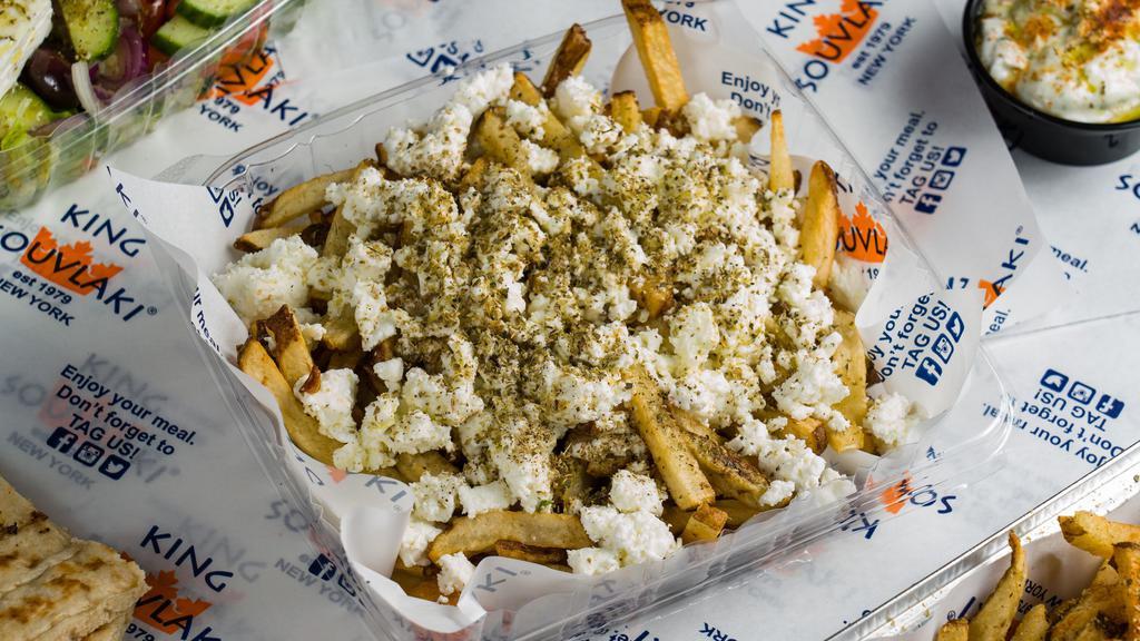 Greek Fries · Topped with Greek feta cheese.