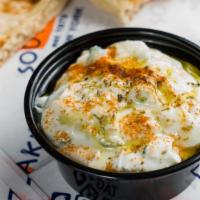 Tzatziki Dip · Homemade with imported Greek yogurt.
served with bread.