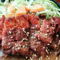 Pork Katsu Donburi (Large) · pork katsu curried with white rice, carrots, cabbage, green onions, and sesame seeds