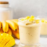 Caribbean Storm Smoothie · Delicious Smoothie made with Mango, coconut, banana, and yogurt.