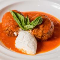 Polpettine · Meatballs with tomato sauce and ricotta.