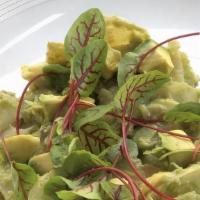 Avocado E Carciofini Salad · Organic thinly sliced raw artichoke hearts with avocado, parmigiana and lemon dressing.
