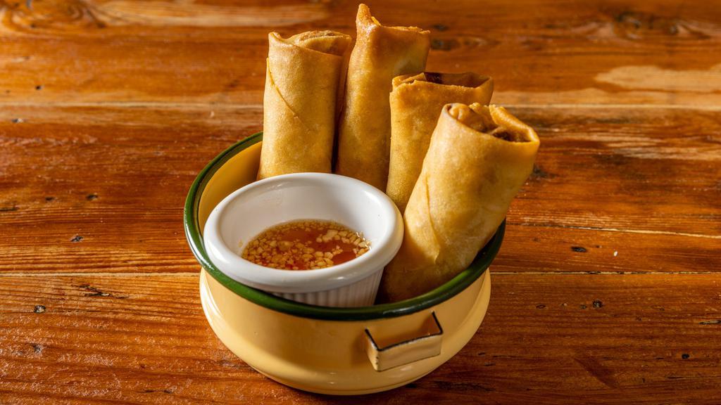 Crispy Spring Rolls · Stuffed with vegetables, glass noodle, cubbage and carrot served with plum sauce.