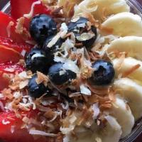 Acai Bowl · Acai base topped with granola, honey, sliced bananas, strawberries, blueberries, and toasted...