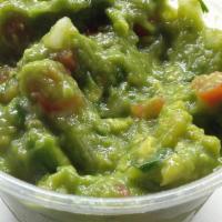 Guacamole · A blend of guacamole, tomato, onion, cilantro, lime juice, garlic, salt and pepper