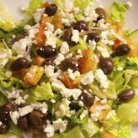 Greek Salad · Lettuce, tomato, cucumbers, black olives, and feta cheese.