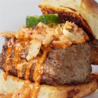 Bulgogi Meatloaf Slider · Four ounces of our delicious Korean BBQ Meatloaf brushed with sizzlin' Seoul Sauce and toppe...