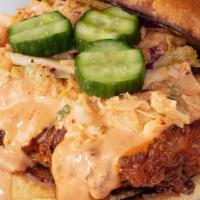 Riverboat Fried Chicken Sammie · Riverboat Fried Chicken drizzled with spicy Gangnam Style sauce, then topped with kimchi col...