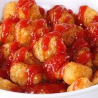 Saucy Tiger Tots · A large basket of Tiger Tots with your choice of our signature sauces.