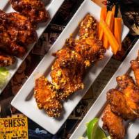 6 Wings · Six wings, your choice of sauce, with crudités and blue cheese