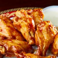 Buffalo Style Wings · Served with blue cheese or ranch.