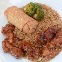 S-2. Sesame Chicken · Crispy chicken tenderloin sauteed in a blended brown sauce w. sesame seeds, surrounded w. br...