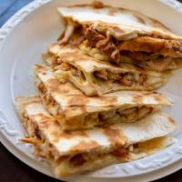 Monterey Jack Cheese Quesadilla · Made with 2 fresh flour tortillas held together with melted cheese.