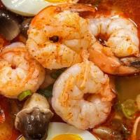 Ramen Noodle Tom Yum Koong · Ramen Noodle with Spicy Shrimp Broth, Cook Egg, Beansprouts, Kale, Scallions, Chili Paste, L...
