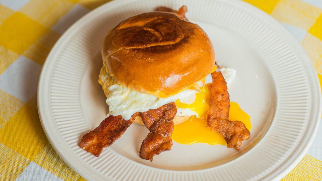 Bacon, Egg & Cheese!  · Toasted brioche bun with two Eggs, Bacon and American Cheese.