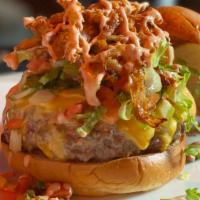 The Classic · Bacon American Cheese burger, JHB sauce, crispy shoestring onions, diced pickle, shredded le...