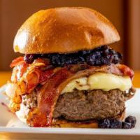 Brie Berry Burger · We suggest our beef burger. Brie cheese, bacon topped with house-made blueberry compote. Ser...