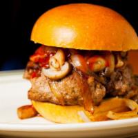Truffle Bbq Burger · We suggest our beef burger.  Smothered with truffle smoked hickory BBQ sauce, grilled onions...