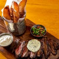 Skirt Steak · Chimichurri sauce, house cut fries and horseradish cream.