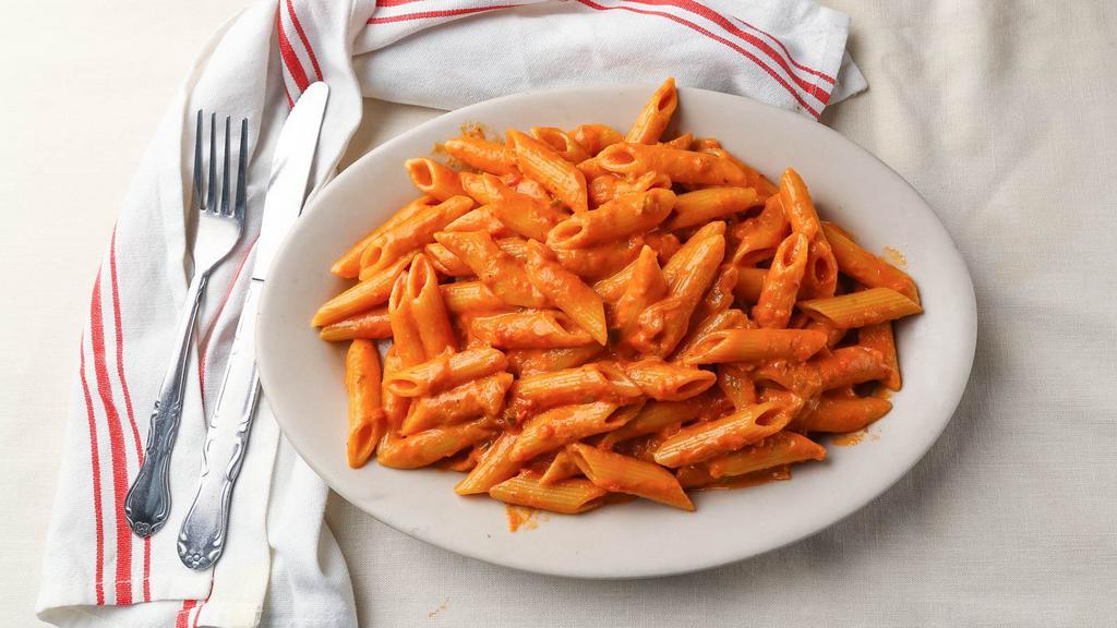 Penne Vodka · Penne simmered in tomato cream and finished with vodka. Served with your choice of soup.
