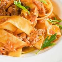 Bolognese · House pappardelle, bone in beef veal and pork sauce