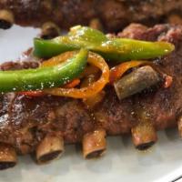 Costillas Bbq · BBQ Ribs. Served with choice of side.