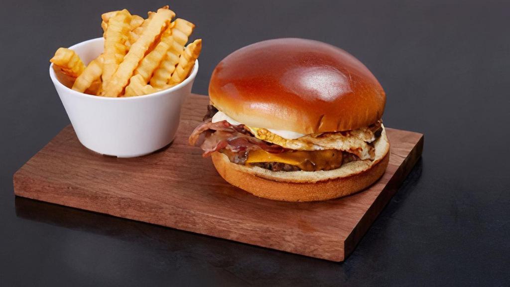 Hangover · Sharp cheddar cheese, fried egg, hickory smoked bacon, and mayo on a brioche bun. Served with crinkle-cut french fries (Regular or Sweet Potato)