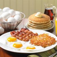 Tremendous Twelve®  · Three eggs, four buttermilk pancakes, choice of hash browns or breakfast potatoes and choice...